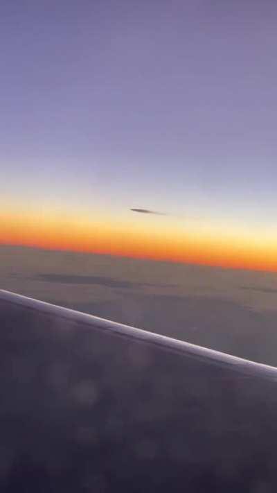 Spotted this plane (?) in the sky from my plane early this morning...