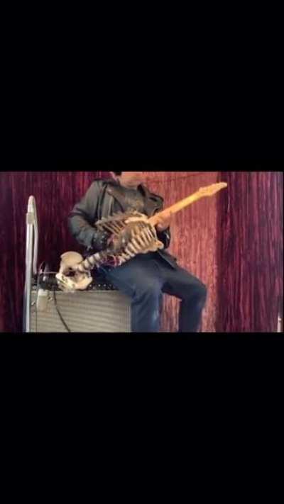 This guy that made a guitar of his uncle’s skeleton