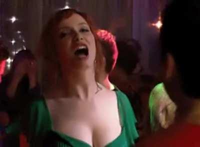 Christina Hendricks Dancing In Green GIF (upscaled, smooth slomo)
