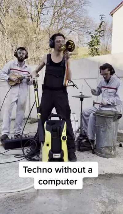 Guys playing techno music with tools