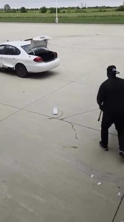 Old post got removed smh. 2 people stealing a tire while someone is working in the back.