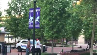 Columbus Police officer trying to use his car to hit protesters in campus courtyard
