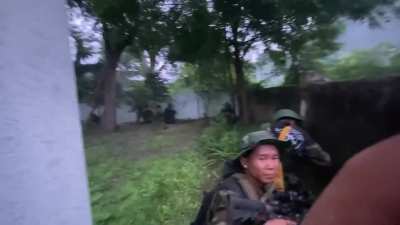 Fighters of the Burma National Revolutionary Army firing at Myanmar Army troops during the Battle of Pale.