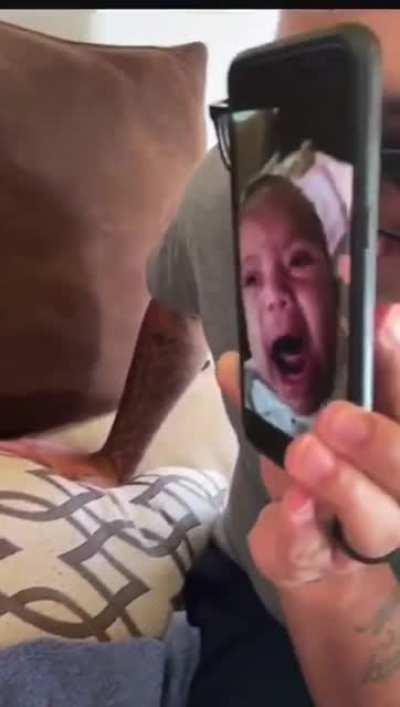 They are showing her a clip of how she is when crying..