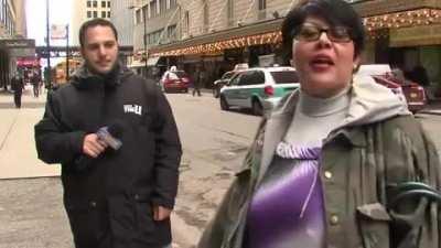 Spitting Woman Takes Over News Taping