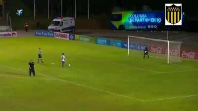 After a match, the winning team's Goalkeeper invited a fan with Down Syndrome on to the field to take a penalty kick.
