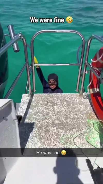 Boy proudly showed off the fish he caught 