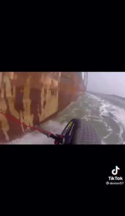 Jet ski almost gets sucked in to cargo ship’s propellers.