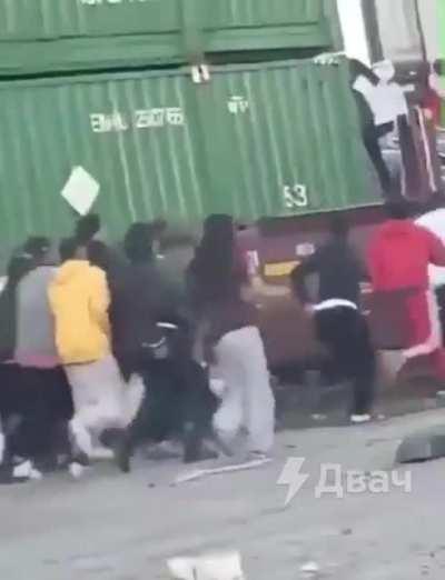 Looters stealing electronics from the fucking train