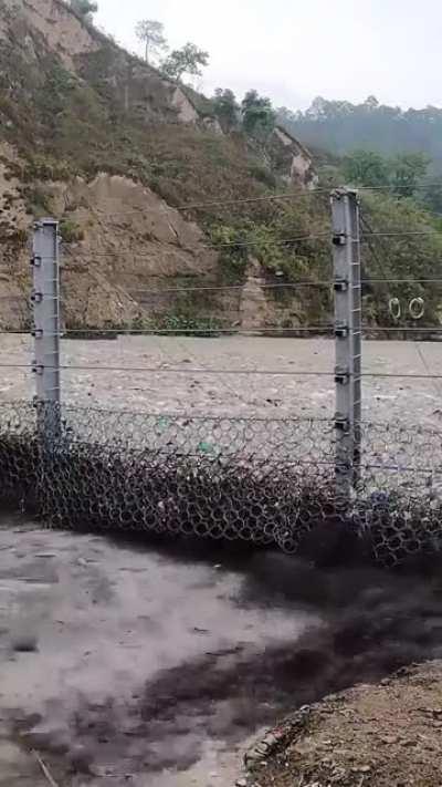 Trashfence Interceptor taking out the trash