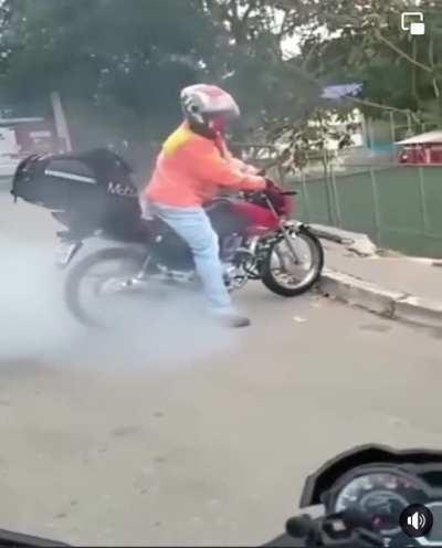 Burning out the tire near a deep hole