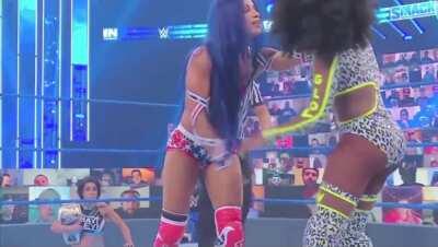 Naomi gets tired of Sasha’s trash talking so she decides to shut her up