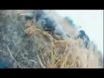 Ukrainian soldier POV from inside APC driving over a landmine in a field said to be near Davydiv Brid, Kherson