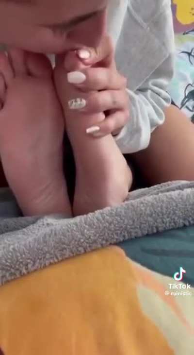 Licking friend’s feet