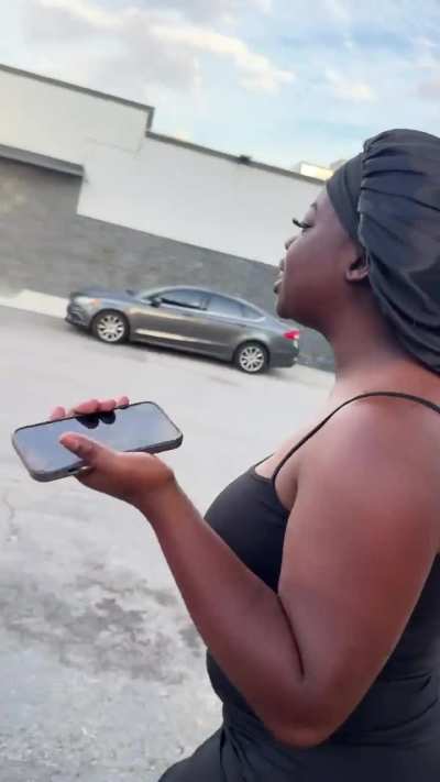 Woman with shower cap on made at another woman for having braids.