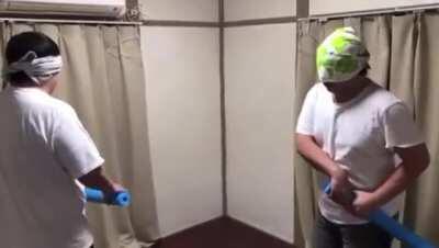 These guys playing blindfolded sword fight
