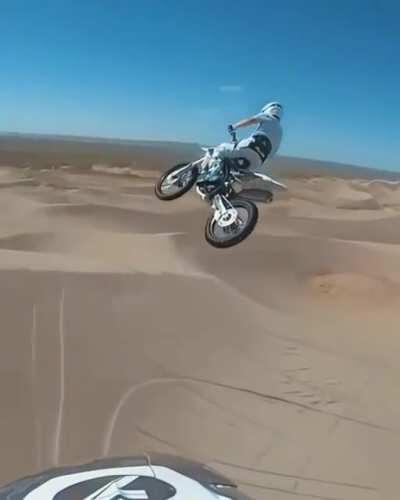 Keeping the bike in the frame while flying off with another bike