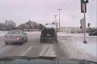 What's worse than running a red light and hitting a car? Running a red light and hitting a police car, of course.