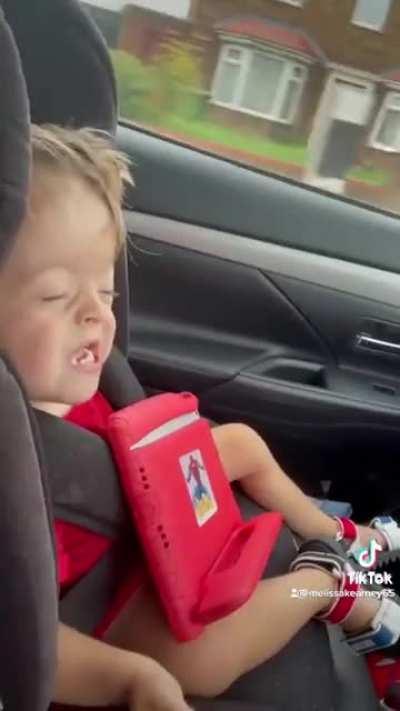 This kid does Phil Collins and kills it (complete with air drumming)