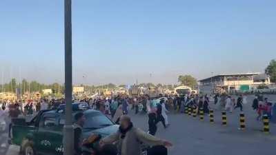 New video from Kabul. Monday morning of people rushing towards Kabul airport with gunfire in background.