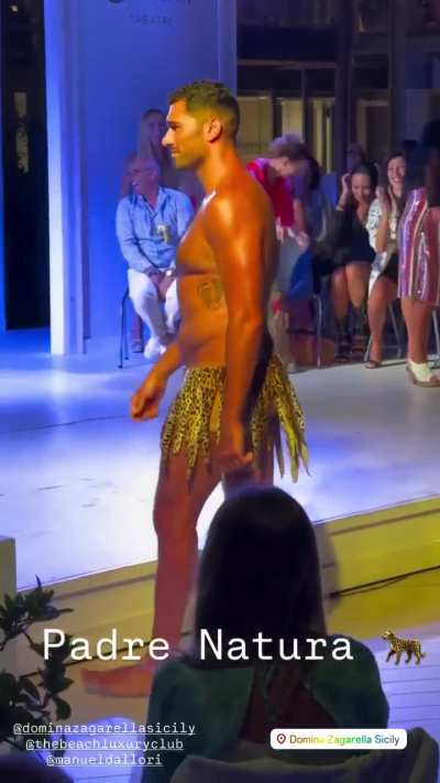 Italian waterpolo player Niccolò Gitto walking the runway in a skimpy outfit