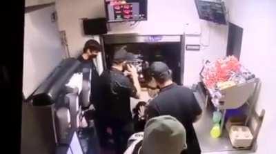 Taco Bell customer climbs into drive thru window punches female employee in face 2021