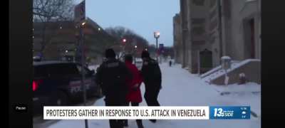 Activist get arrested mid-interview after speaking out against U.S. action in Venezuela