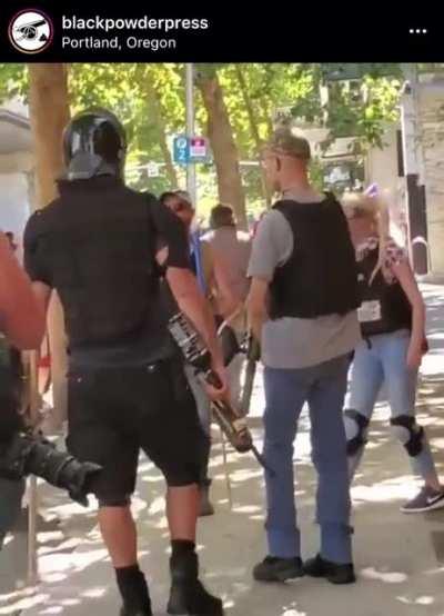 Proud Boys in Portland reportedly threw an explosive device and fired two live rounds at BLM demonstrators. Here they are indiscriminately assaulting people with bear mace and paintballs while the police are nowhere to be seen.