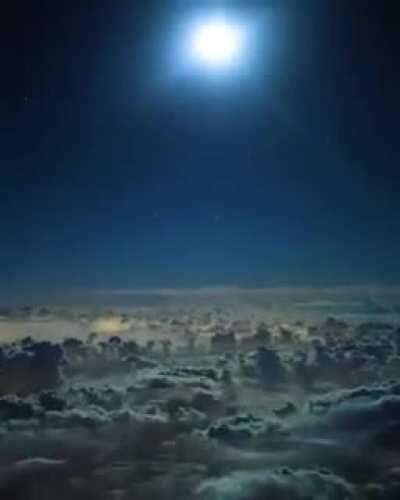 Cockpit view of moving clouds over Arabian Peninsula