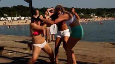 Girl takes a mean kick to the pussy