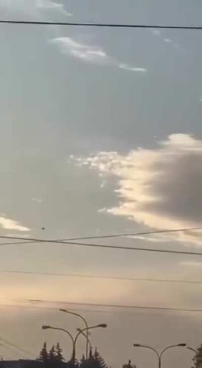 A Russian civilian records an incoming Ukrainian 