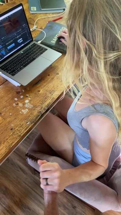 Taking care of both of her jobs