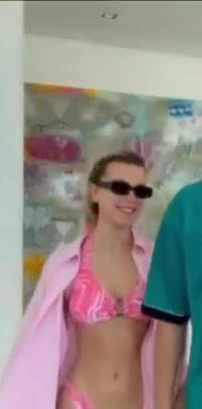 Millie in a pink bikini