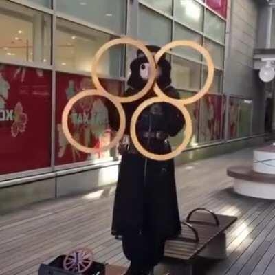 The Spinner of Humanity's Fate, living embodiment of 2020 and oracle of the Virus