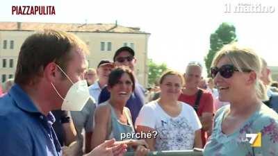 Anti-masker Karen tries to kiss mask-wearing journalist