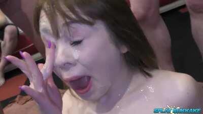 Lusty young Cherry English takes some huge dumps of bukkake cum in her face