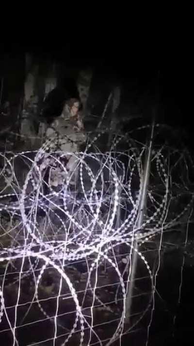 The drunk belarusian soldier wants polish cigarette. The polish soldier just answers 