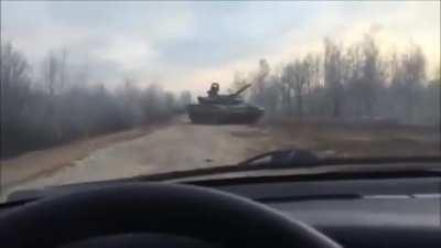 Guy plays Chicken with a tank