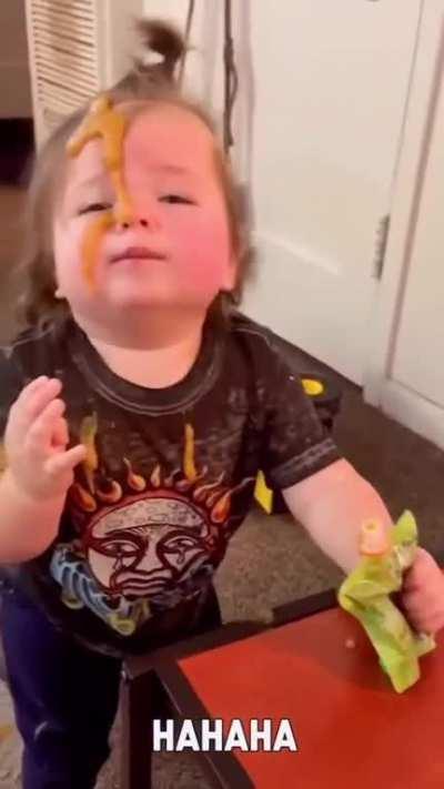 Trying to drink some juice