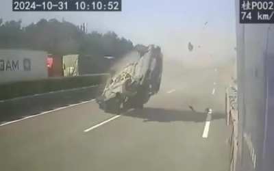 Car flips after rear-ending trailer