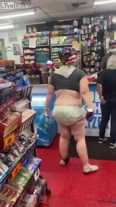 Half naked woman goes to store