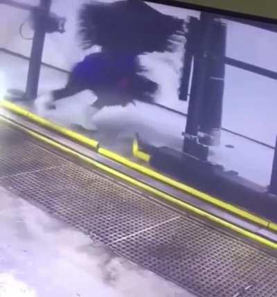 Car wash attendant gets stuck in rotating industrial brush