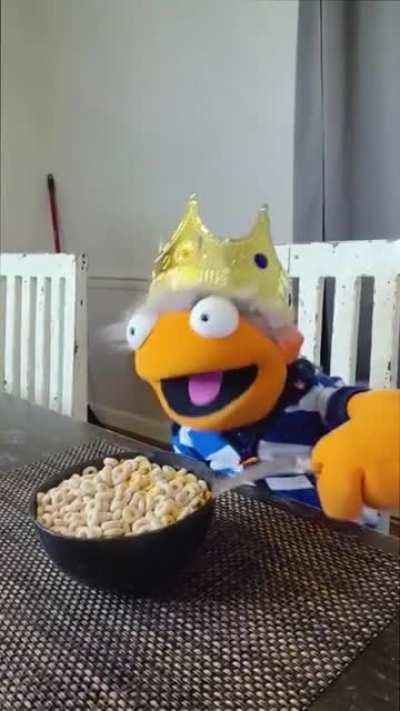 peacefully eating cereal