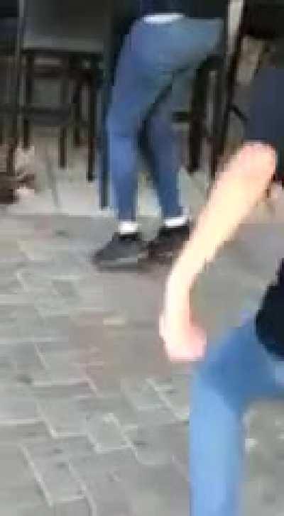 Girls throwing bird when an unexpected visitor appears.