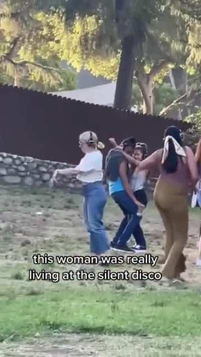 One Very Happy Dancing Woman Looking Like Without a Care in the World!