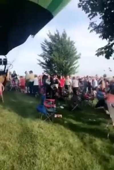 Spectators get bowled by hot-air balloon