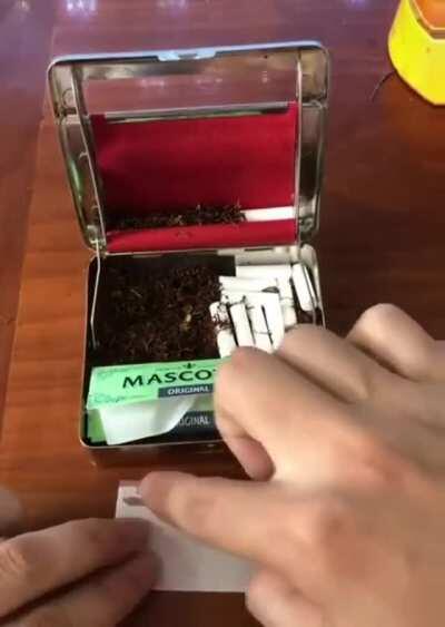 A cigarette rolling case
