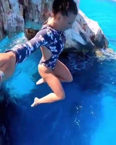 Cliff jumping into the crystal blue Mediterranean Sea