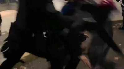 Rioters intent on burning down an apartment building because it has a Starbucks on the main floor