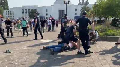 Proud Boys assault a lone BLM protester.